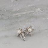 Celebrate you. Stunning Diamond and Pearl Earrings in 14K Gold - Peters Vault